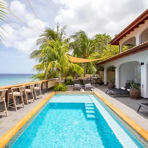 https://atlantis-beach-house.comcaribbean.com